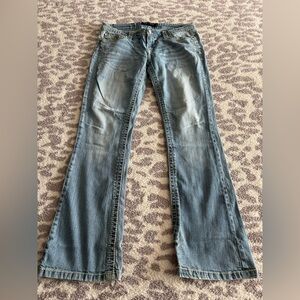 ripped bootcut jeans